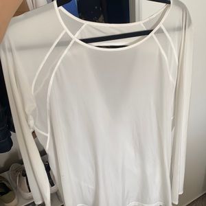 Gently used (worn 2 or 3 times) Lululemon top. Mesh on the front and back.